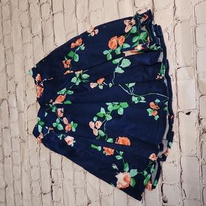 Small blue floral skirt with pockets and elastic waist